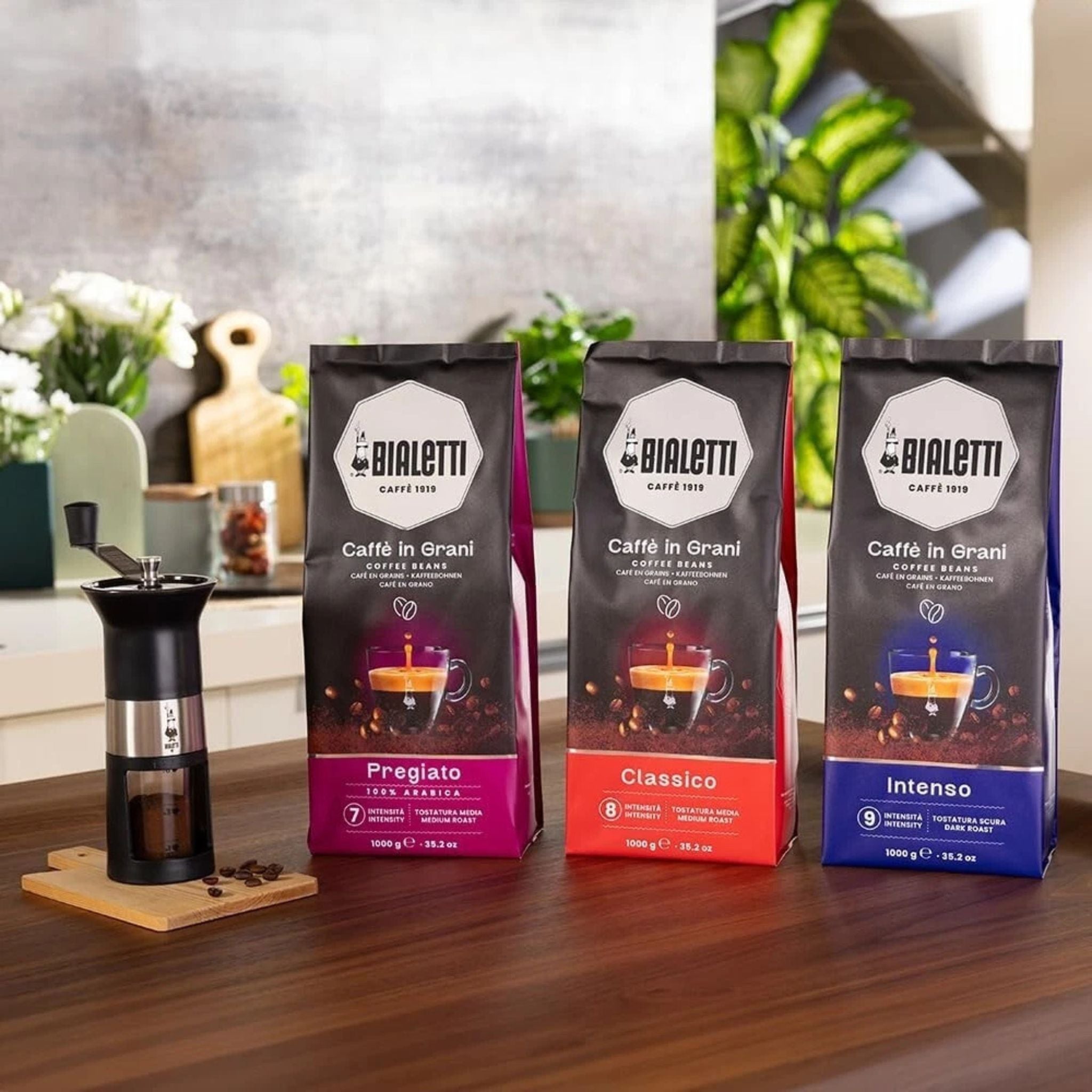 Three Bialetti coffee bags labeled 'Pregiato', 'Classico', and 'Intenso'. Authentic Italian Coffee Beans. Wholesale suppy Garden State. 