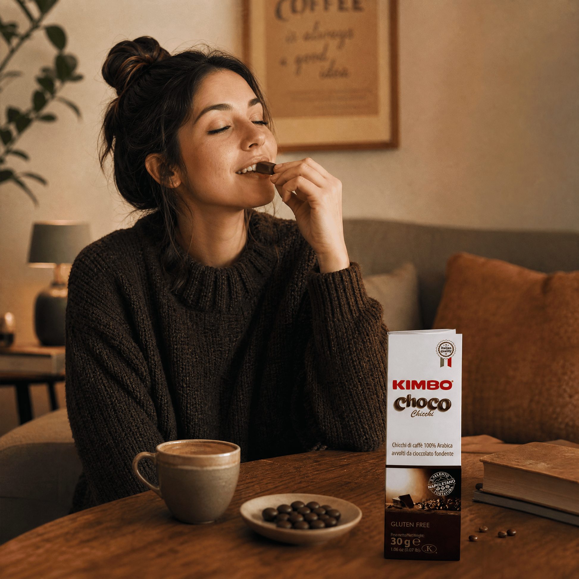 Person enjoying Kimbo Choco dark chocolate covered Arabica coffee beans, Italian coffee snack ideal for home, office breaks, coffee lovers and everyday indulgence