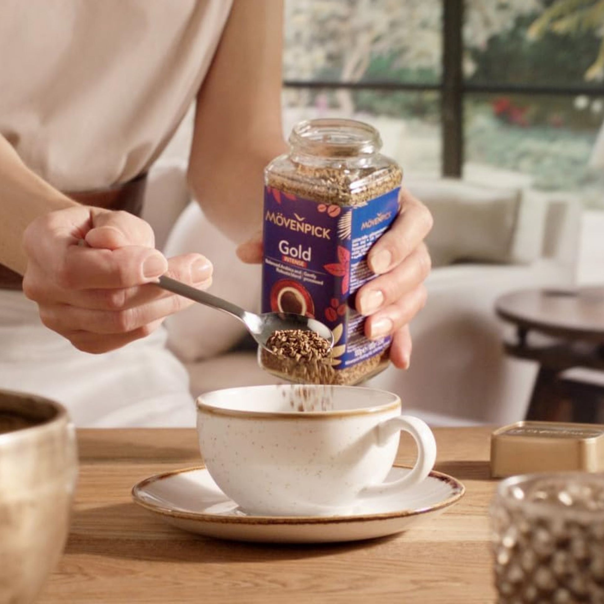 GardenState – Mövenpick Gold Instant Coffee in 200g jars, featuring two variants: Original made from 100% Arabica with medium roast and Intense made from Arabica and Robusta with dark roast, ideal for offices, hotels, and catering use.